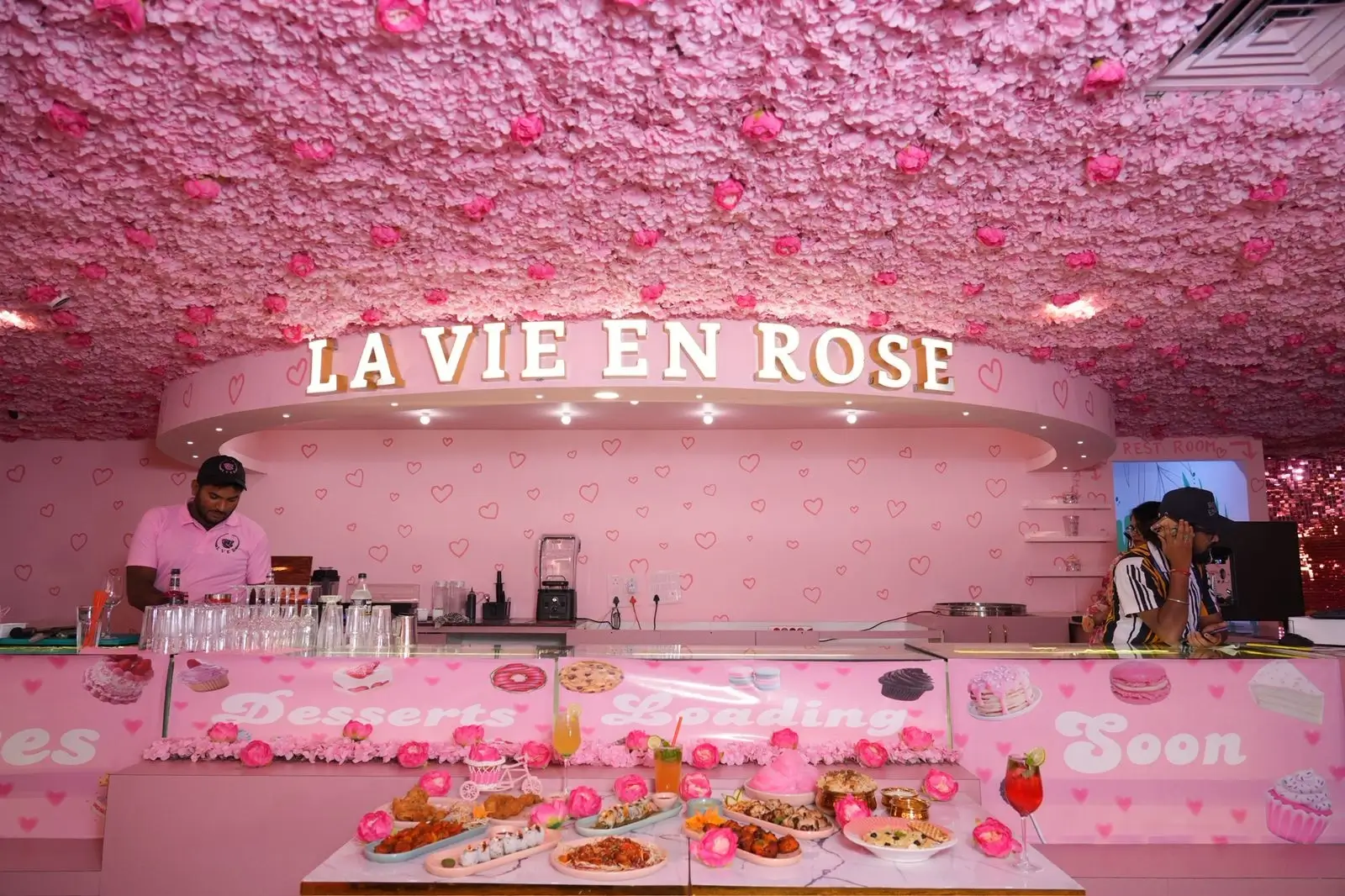 Rose-themed cafe decor at La Vie En Rose Hyderabad